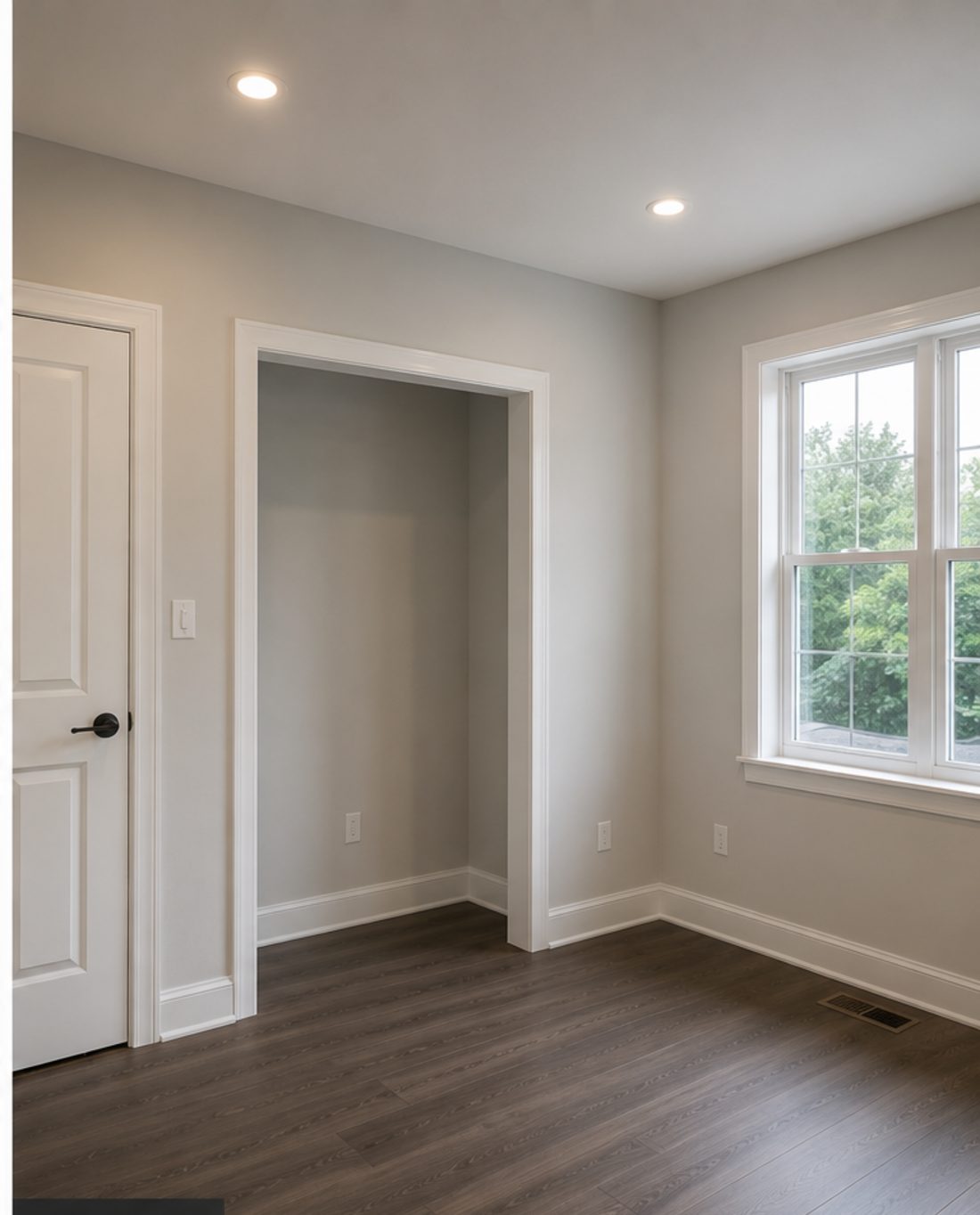 Bedroom with new drywall, primed and painted in soft grey